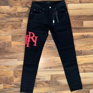 AMIRI Black Slim Jeans with Red Leather Logo
